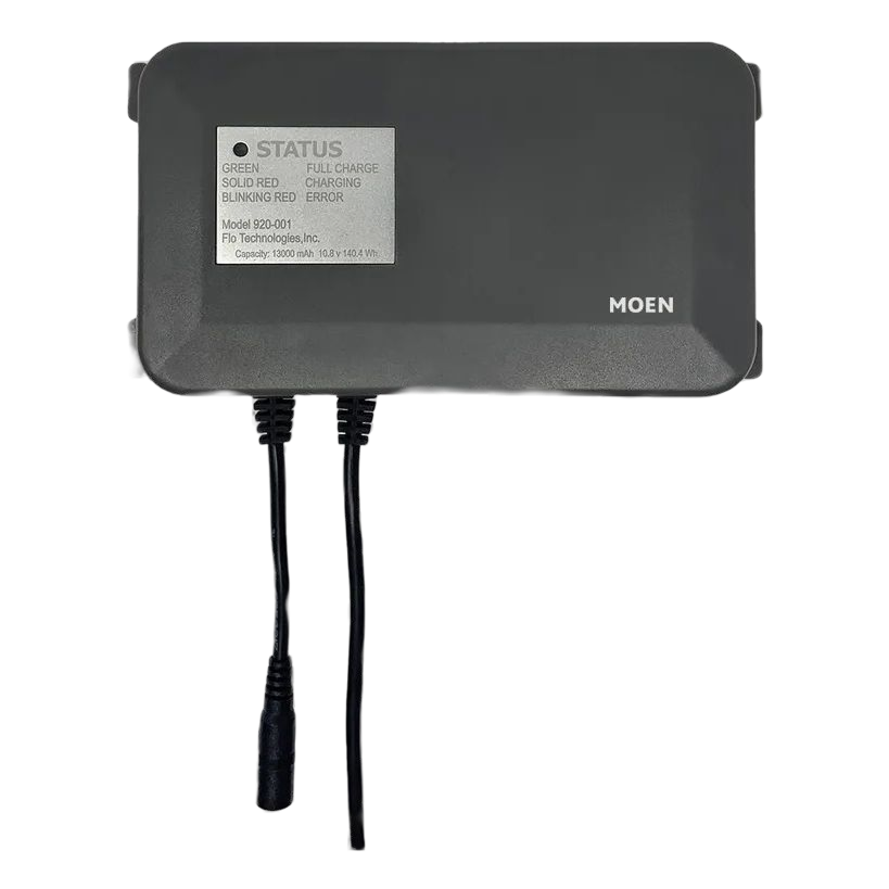 MOEN Status 200-001 electronic module in dark gray with a white label and two black cables, shown on a white background.