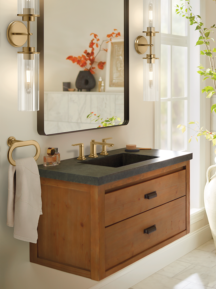 A floating bathroom vanity with a Greenfield Two-Handle Low Arc Bathroom Faucet