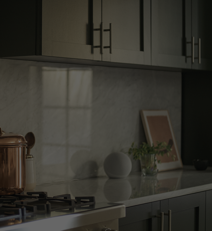 A dark modern kitchen interior backdrop.