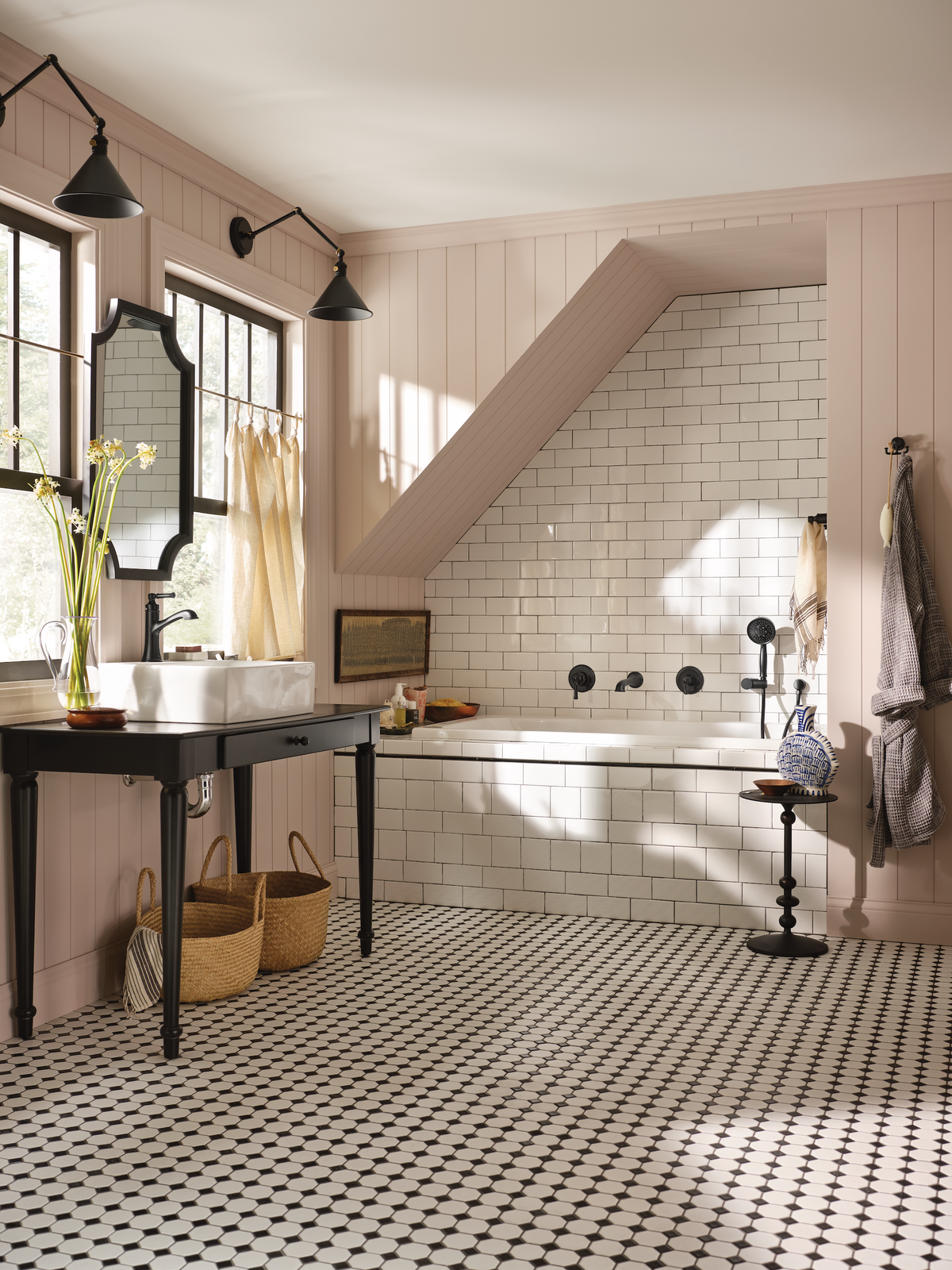Bathroom with white tiled walls, black and white patterned floor, and wooden accents.